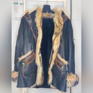 Black leather with tan Coyote Fur Very intricate beading and leather work custom